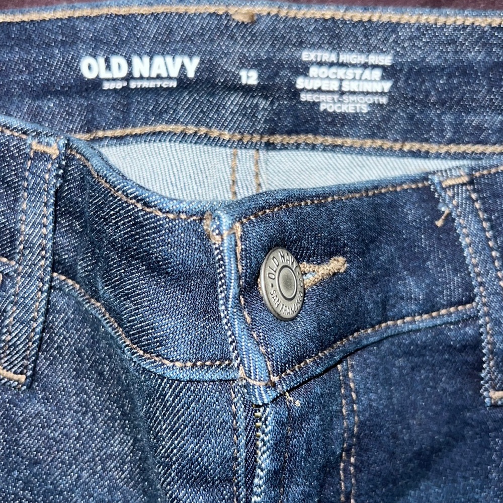 Size 12 extra high rise rockstar super skinny jeans dark navy. great condition